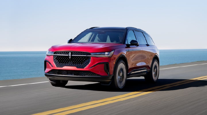 A 2026 Lincoln Nautilus® SUV is being driven on a seaside roadway. | Irwin Lincoln in Freehold NJ