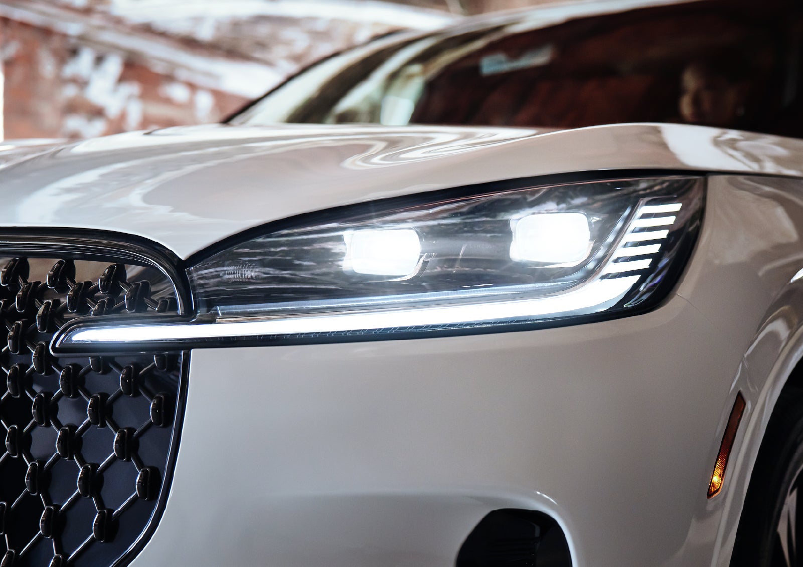 A close-up of a headlamp on the 2027 Lincoln Aviator® SUV is shown. | Irwin Lincoln in Freehold NJ